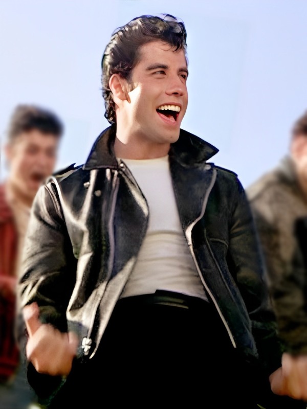 John Travolta from the movie Grease with the iconic greaser look.