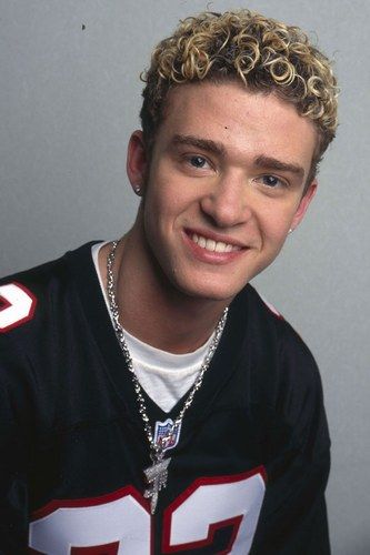 Justin Timberlake rocking a frosted tip hairstyle in the 1990's.